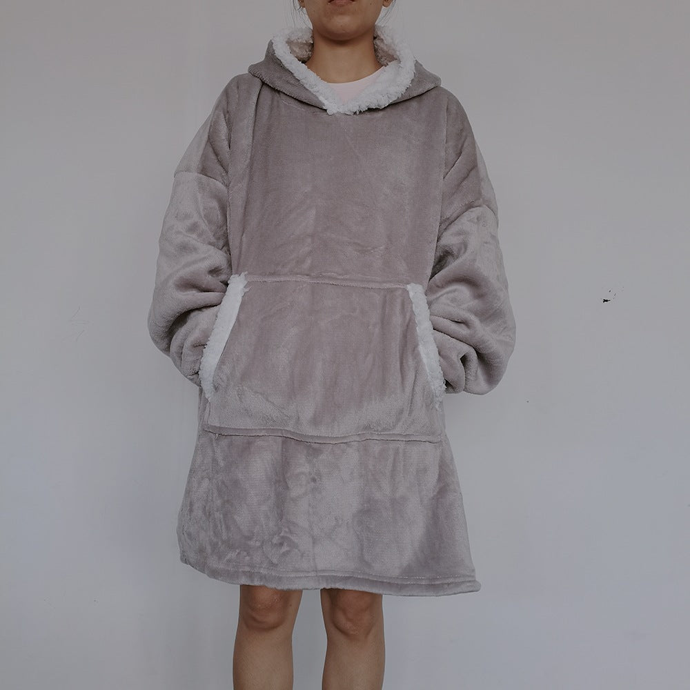 Oversized pleddgenser med hette og lomme