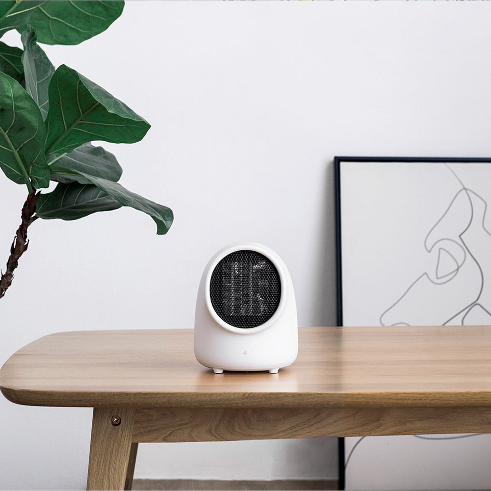 Liten varmeovn 500 W med 220 V, 580 g og 15 cm bredde