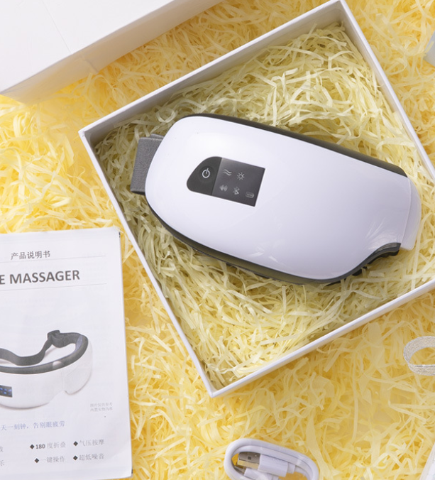 Øyemassasje med varme, lufttrykk og Bluetooth-musikk