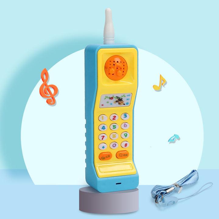 Leketelefon formet som gulrot med knapper