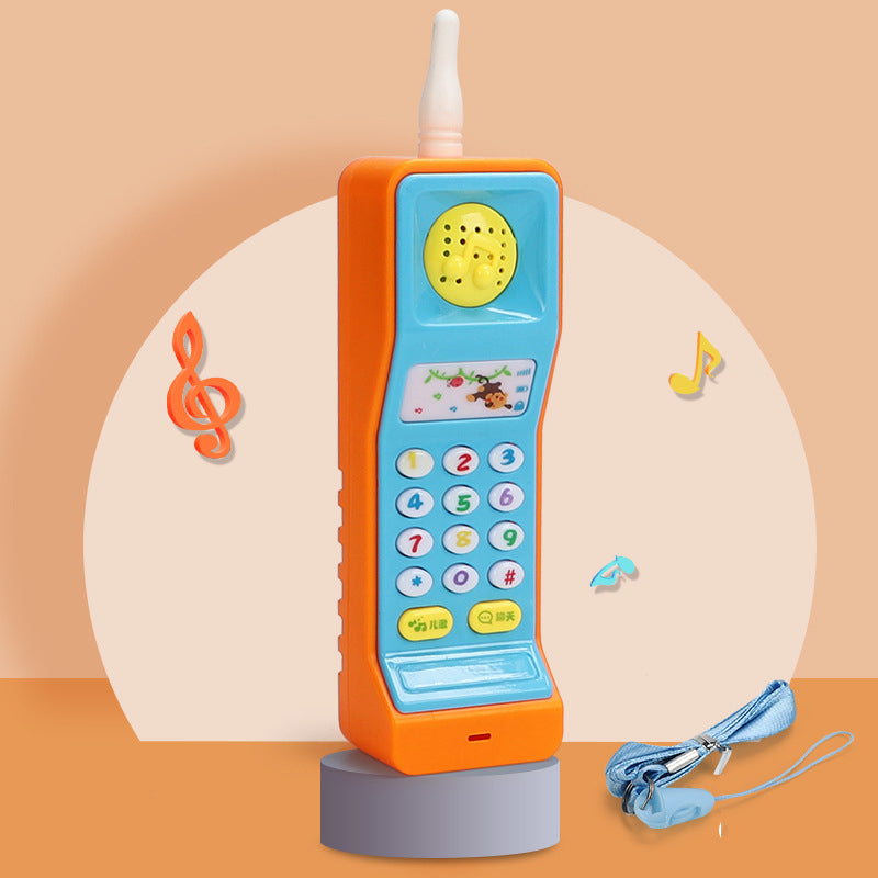 Leketelefon formet som gulrot med knapper
