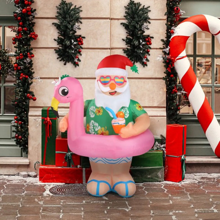 Oppblåsbar nisse i hawaiiskjorte på flamingo