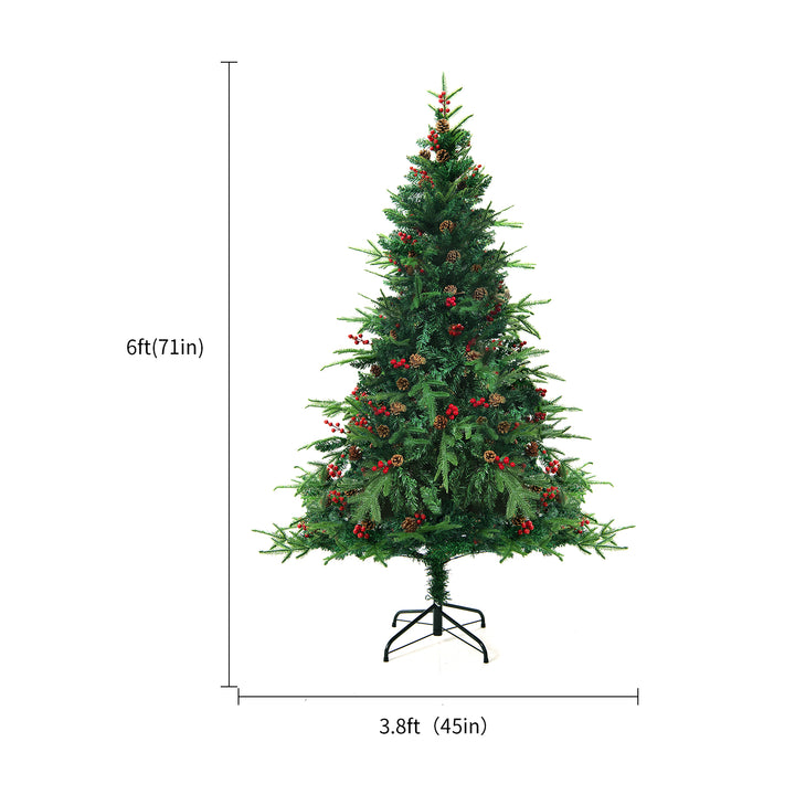 Kunstig juletre med varmhvite lys i stue