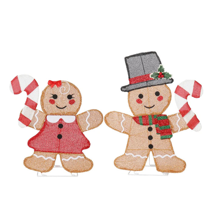 Varmeriket To lysende pepperkakefigurer med polkagris