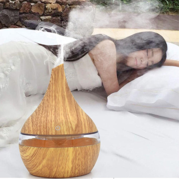 Aroma diffuser i treimitasjon med LED-lys – stille damp