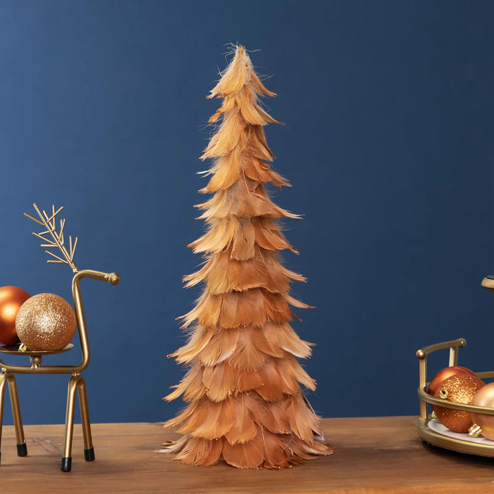 Lite oransje fjærjuletre med glitter