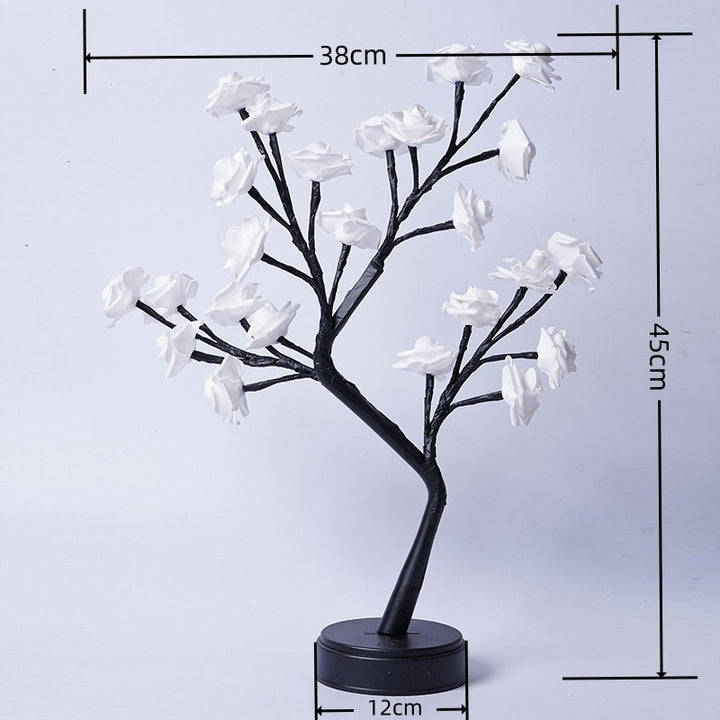 Rosetrelampe med lysende roser