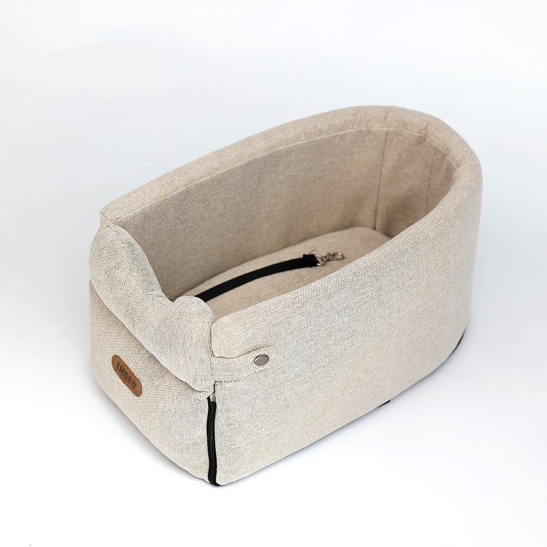 Bilsete for liten hund på armlenet