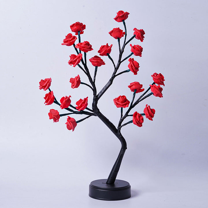 Rosetrelampe med lysende roser