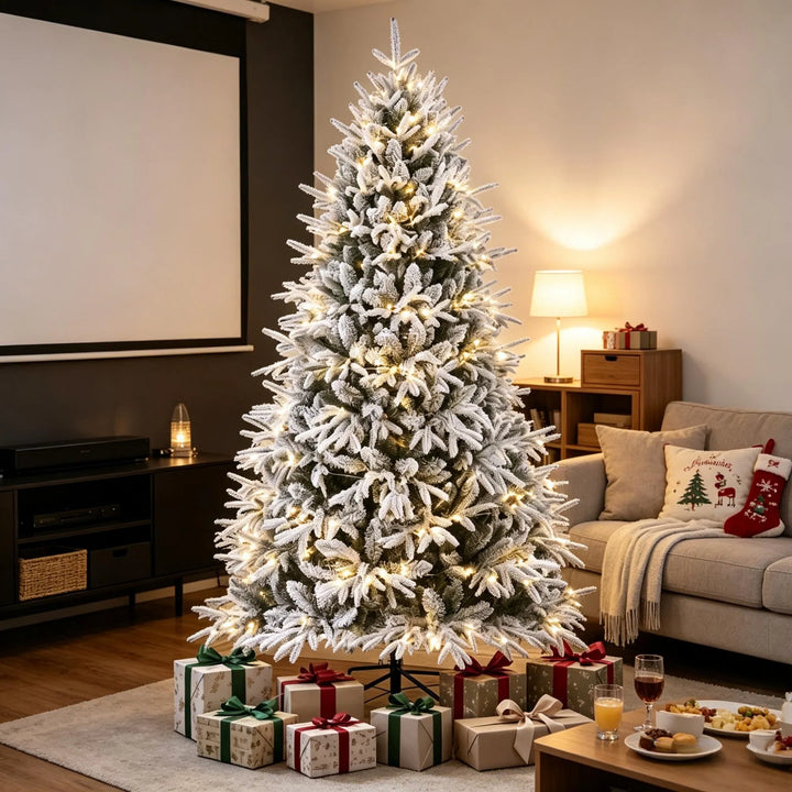 Ekstra fyldig snødekt juletre med lys