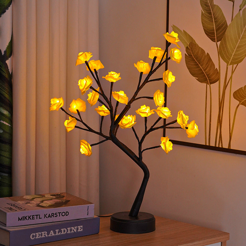 Rosetrelampe med lysende roser