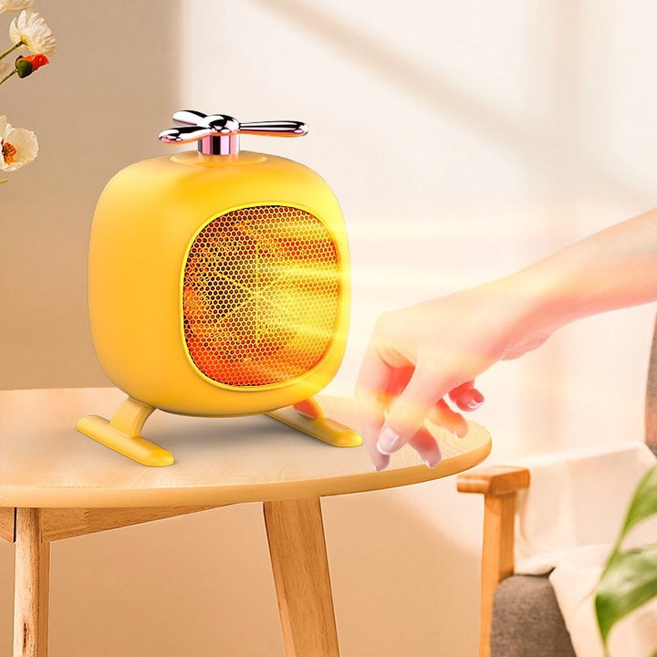 Gul mini vifteovn formet som helikopter