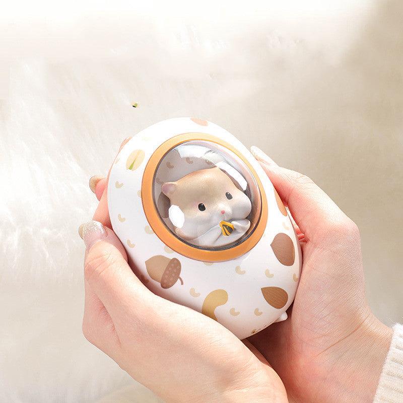 Håndvarmer og powerbank med hamster, 5000 mAh og fire nivåer