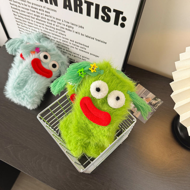 Lodne plysjsokker med monsterøyne