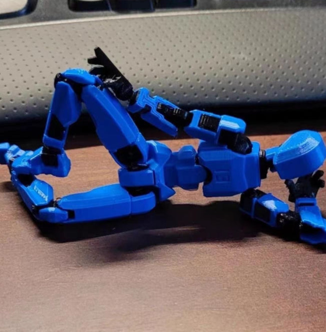 Bevegelig robotfigur i positur