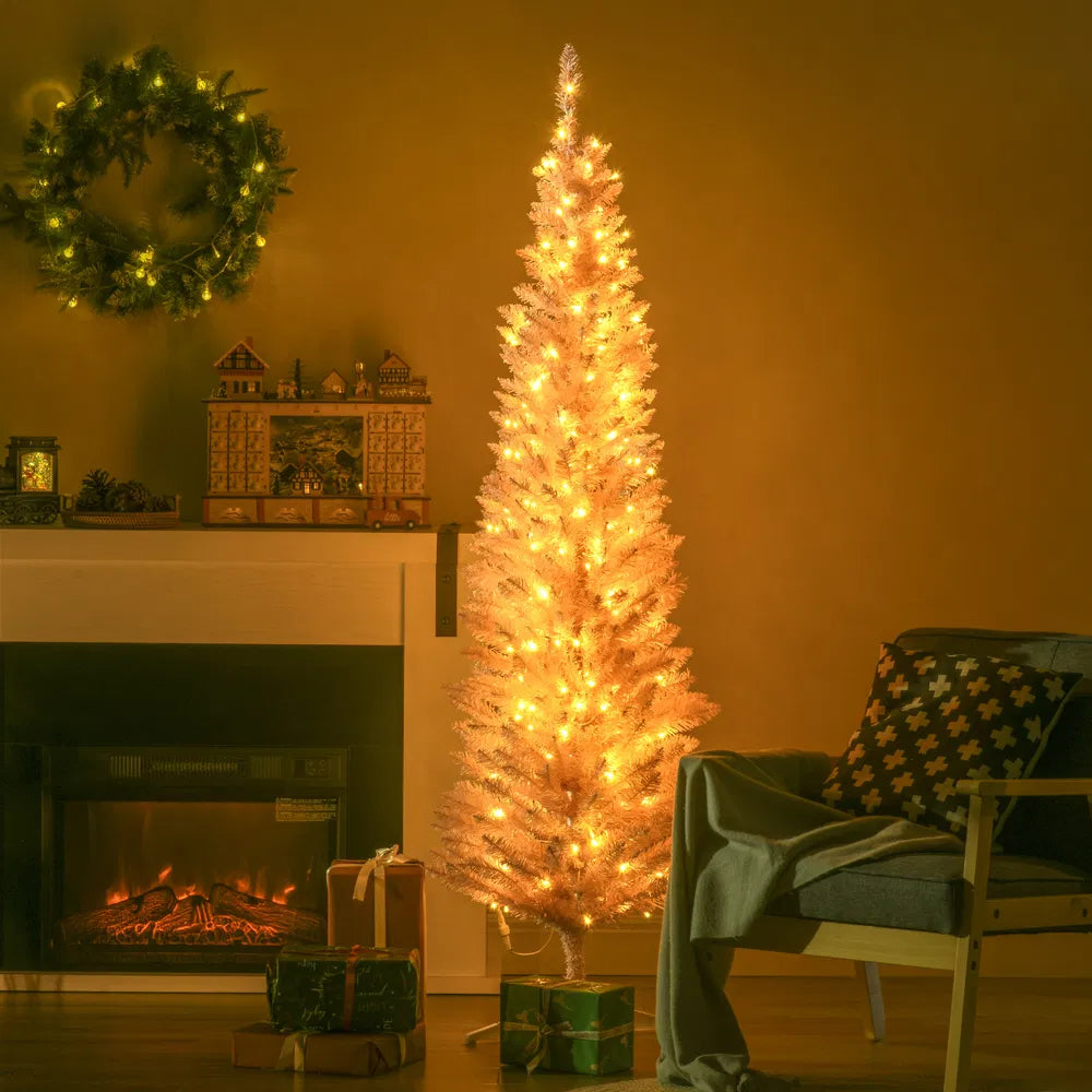 Lite hvitt juletre med varmhvite lys