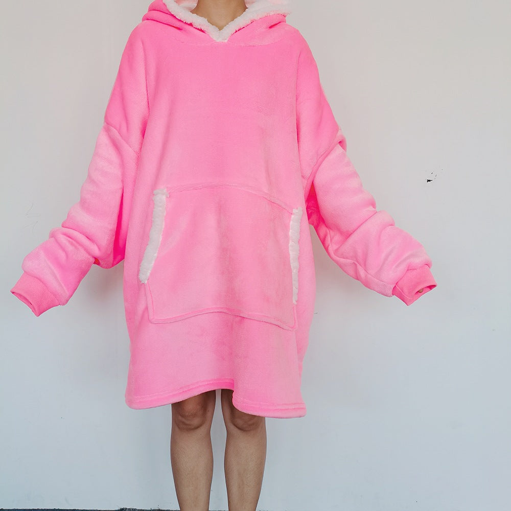 Oversized pleddgenser med hette og lomme