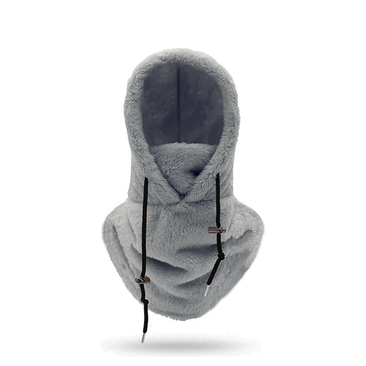 Person med plysjbalaklava i beige