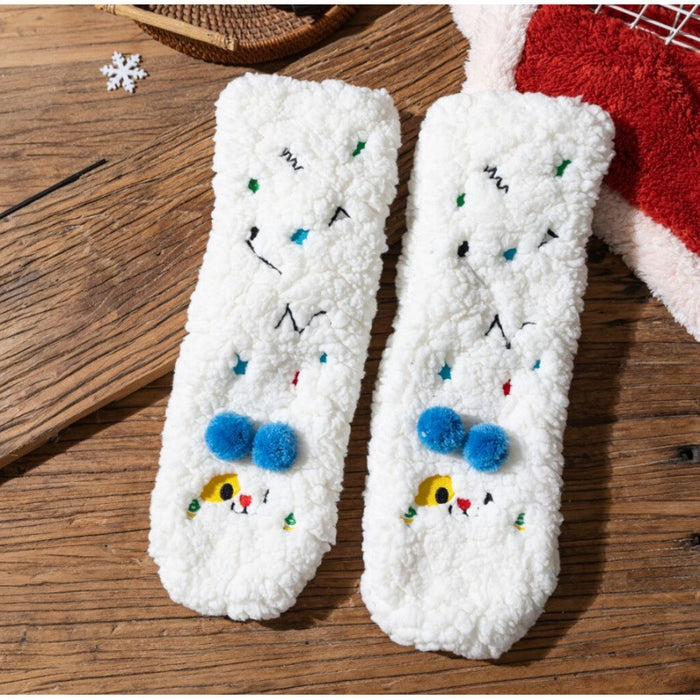Varmeriket Lodne sokker med broderte fjes og små dusker