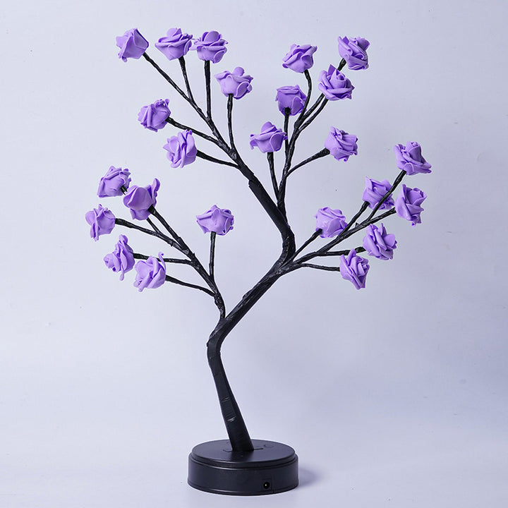 Rosetrelampe med lysende roser