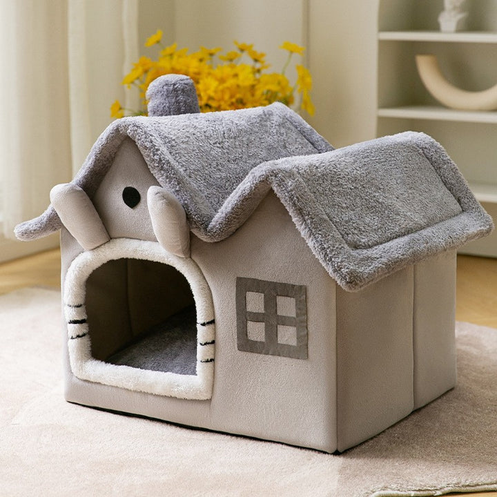 Plysjhule formet som hus til katt