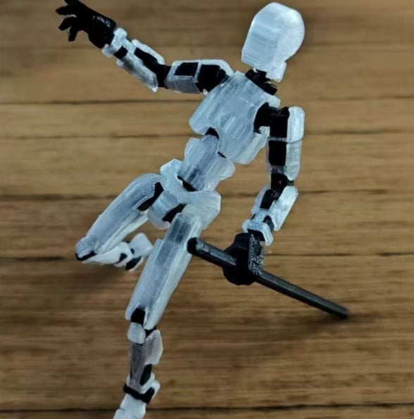 Bevegelig robotfigur i positur