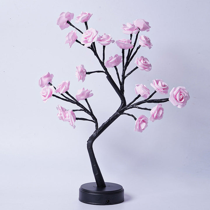 Rosetrelampe med lysende roser