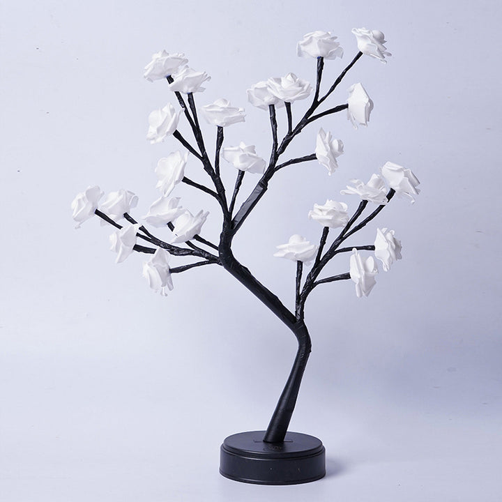 Rosetrelampe med lysende roser