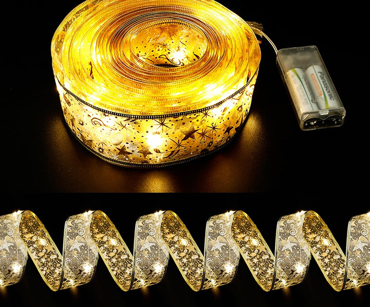 Gullbånd med LED-lys på juletre
