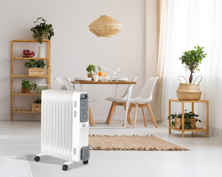 Hvit oljefylt radiator med elleve ribber