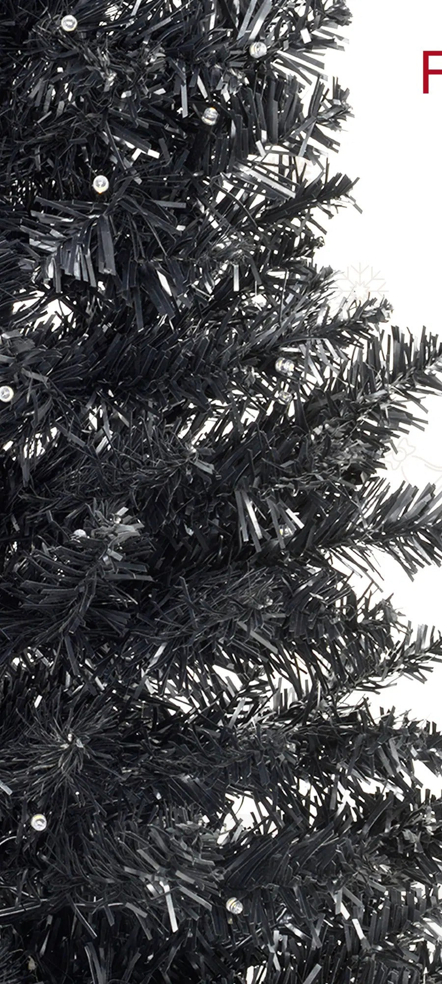 Smalt svart juletre med varmhvite lys