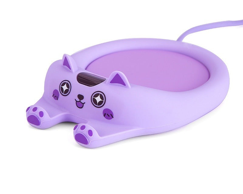 Hvit koppvarmer formet som katt med kopp