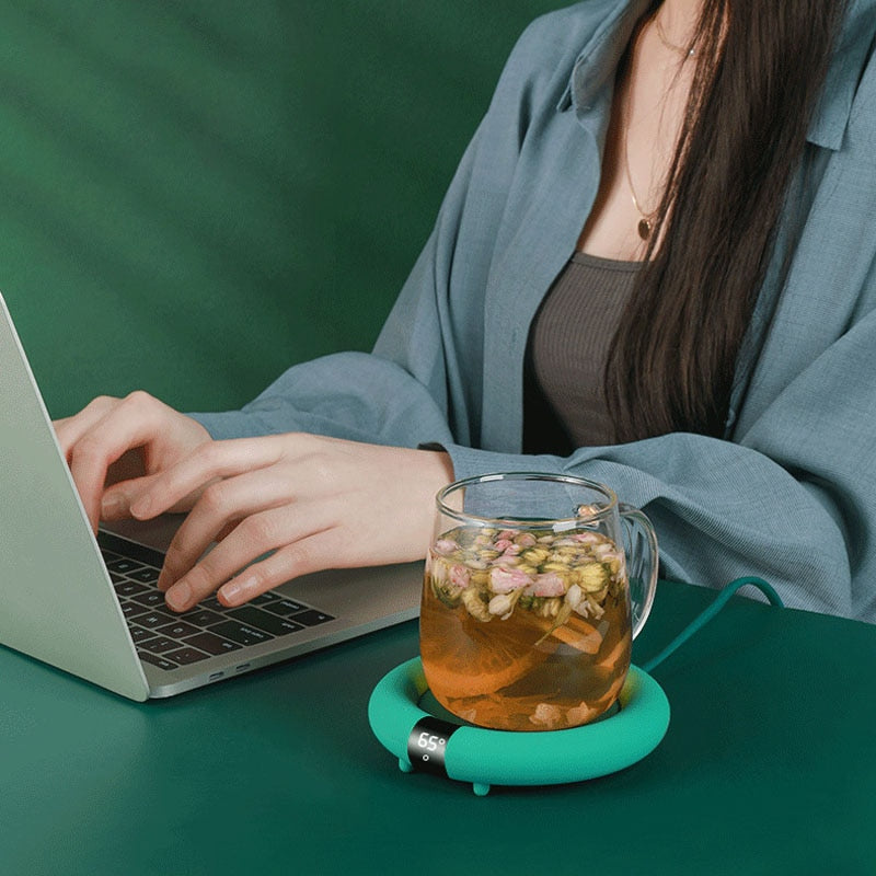 Varmeriket™ Søt koppvarmer i pastell som holder kaffe og te varm på pulten