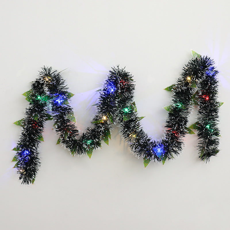 Glittergirlander med LED-lys og nisser