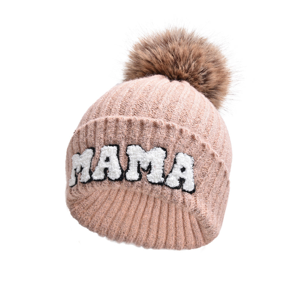 Ribbestrikket MAMA-lue med lodden dusk