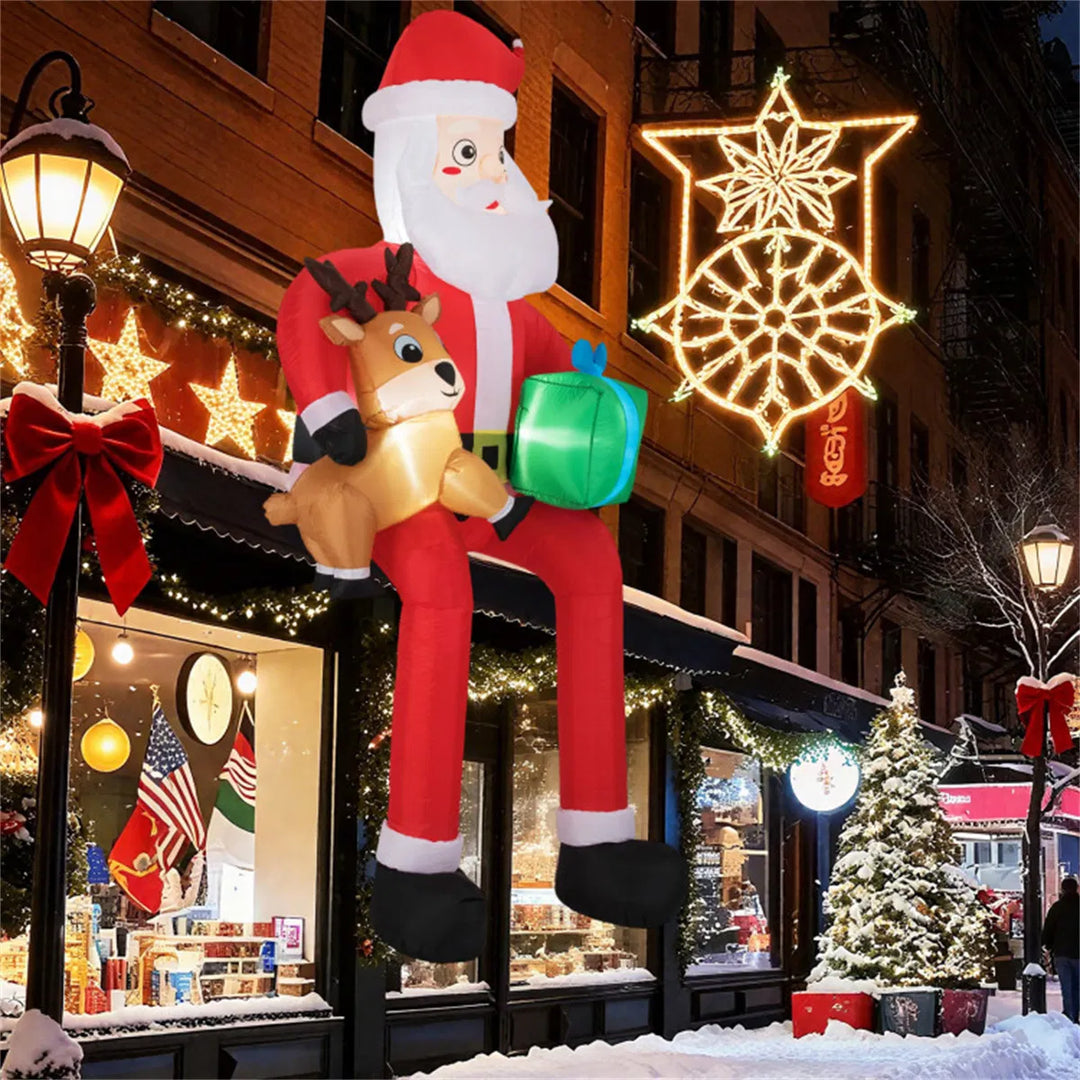 Stor oppblåsbar sittende nisse med reinsdyr