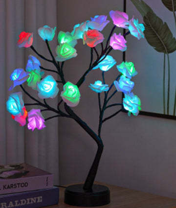 Rosetrelampe med lysende roser