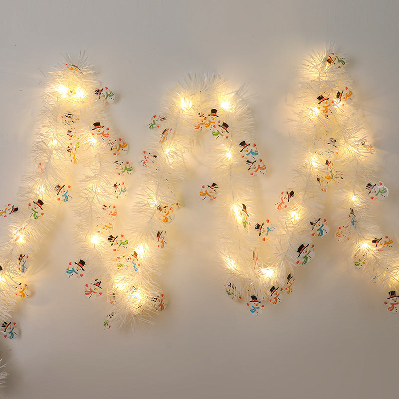 Glittergirlander med LED-lys og nisser