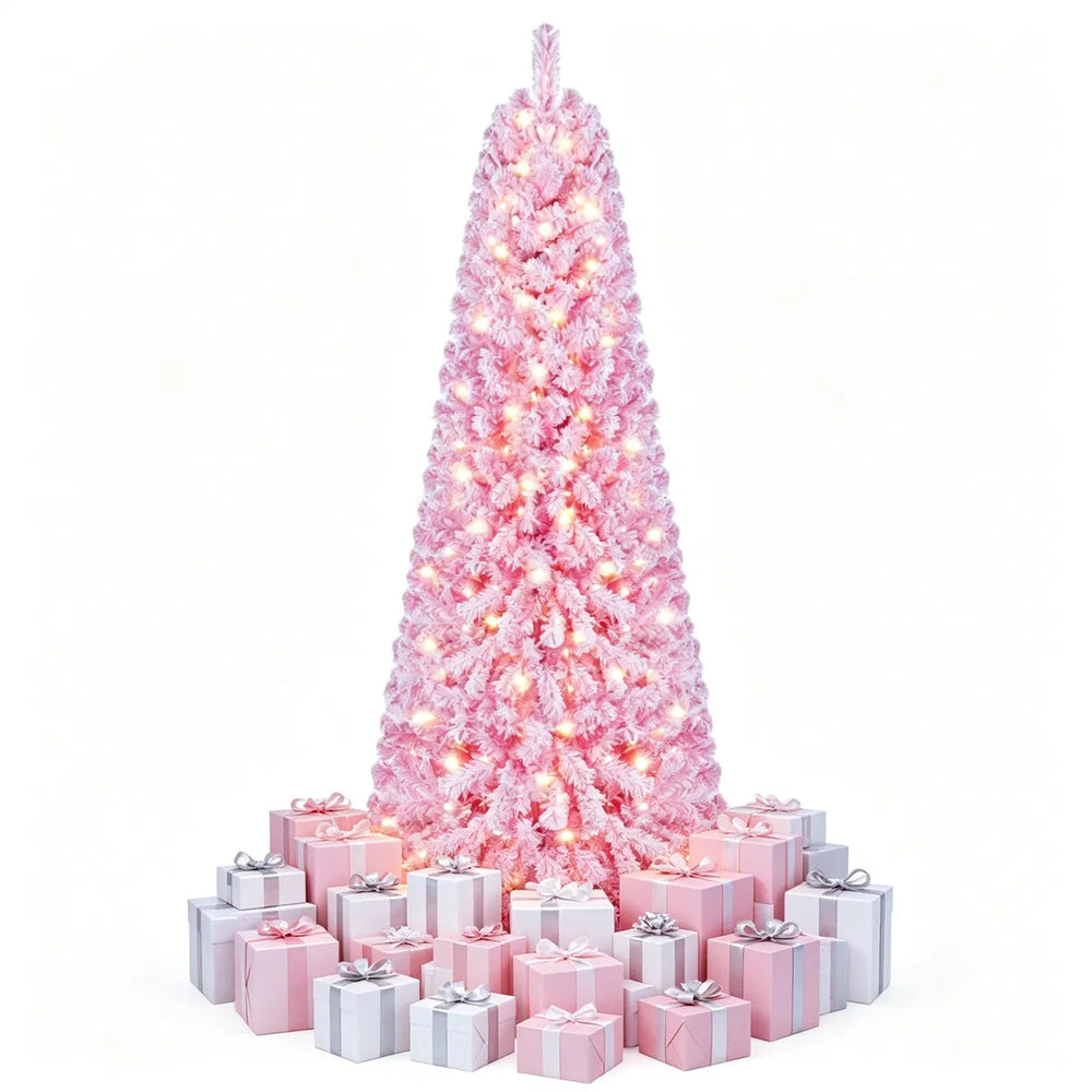 Rosa juletre med kunstsnø og lys