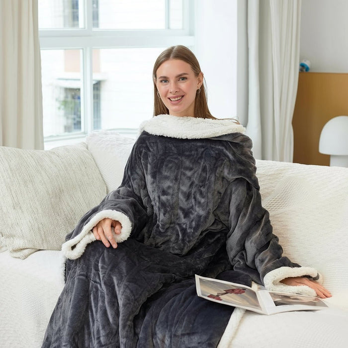 Varmeriket™ Oppvarmet teppe med ermer og fotlomme i sherpafleece