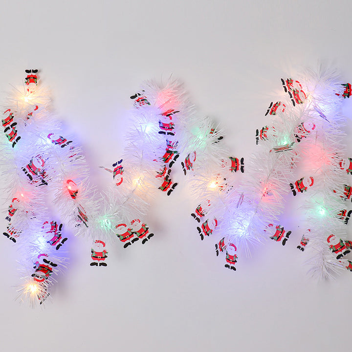 Glittergirlander med LED-lys og nisser
